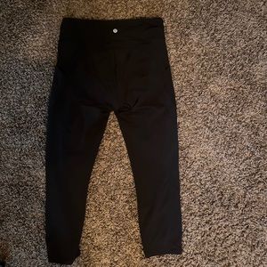 Black Lululemon leggings.